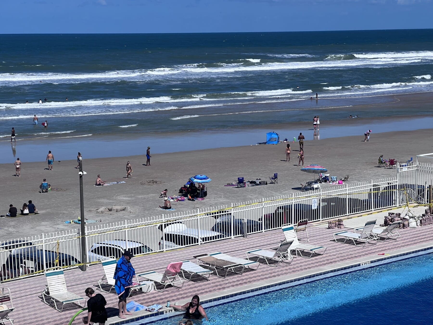 View from the balcony watching everyone enjoy driving on the beach