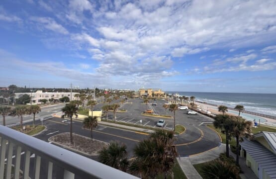 the yellow building is the LifeGuard Station. Swim with confidence being right next to the life guard