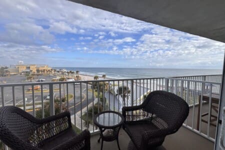 balcony with a beautiful view of the ocean and the Daytona Beach boardwalk