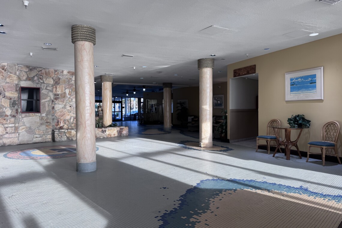 lobby from the doors heading to the elevator