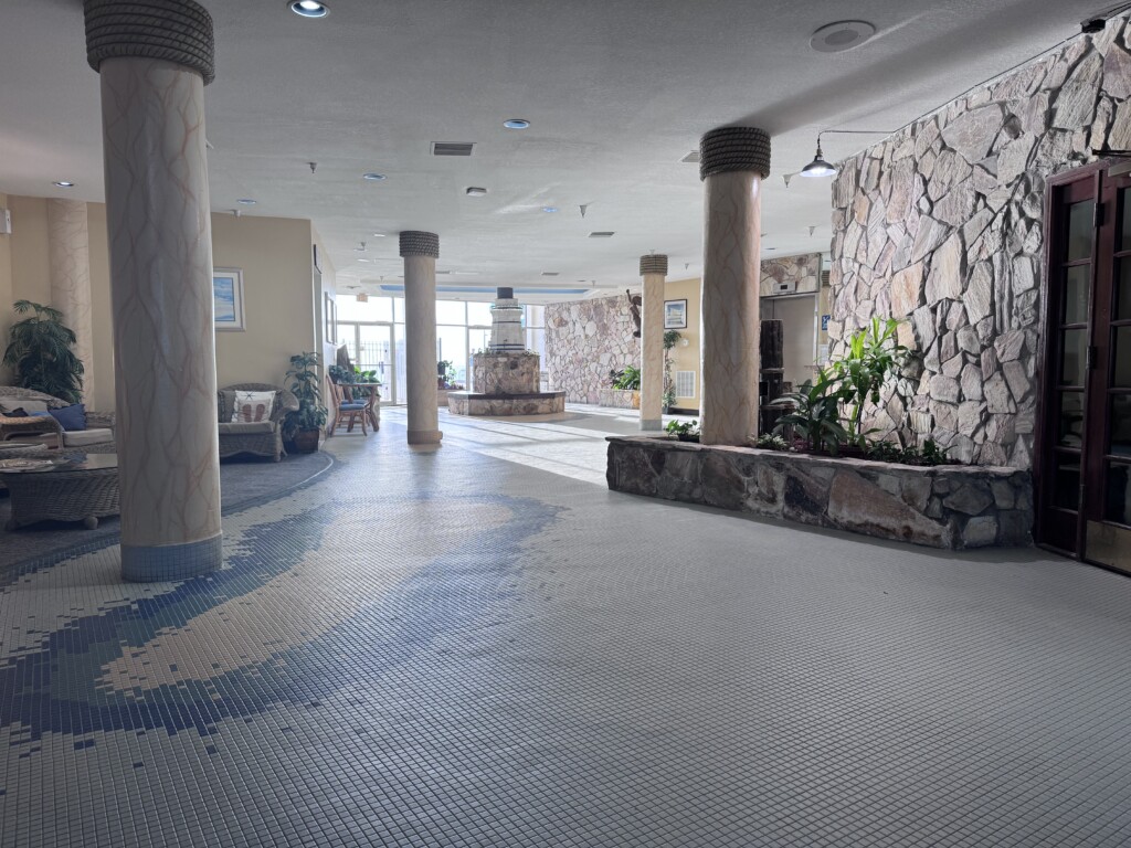 just ahead you will have the elevators and the doors to the pool deck