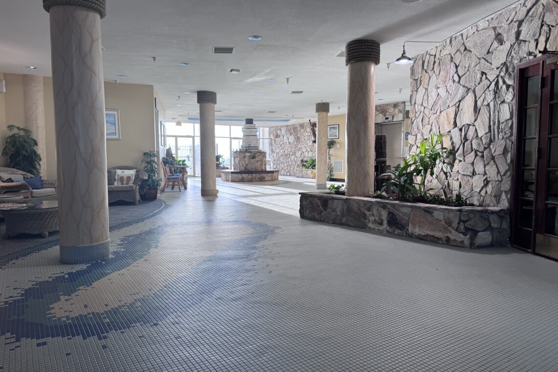 just ahead you will have the elevators and the doors to the pool deck