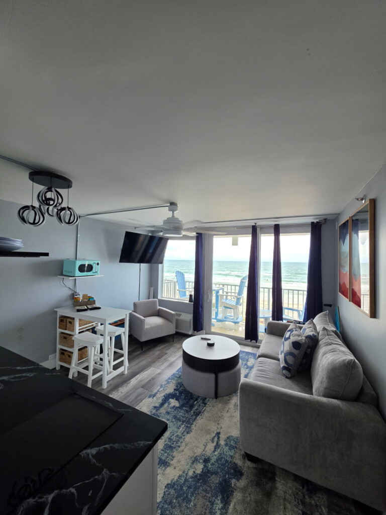 Very usable living room. table lifts up and we supply plenty of games for you
