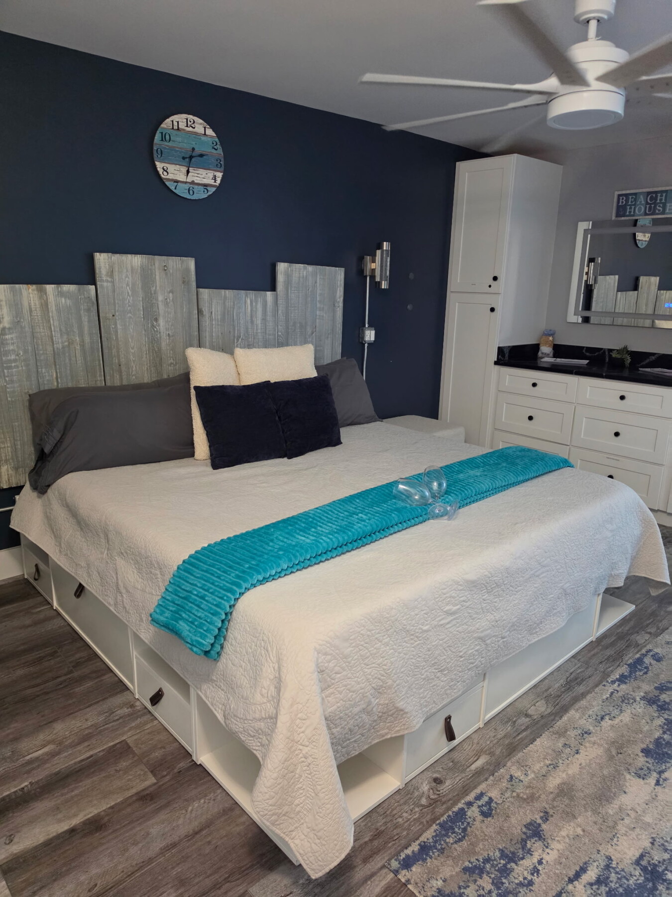 King bed with a full wardrobe for getting ready on those date nights